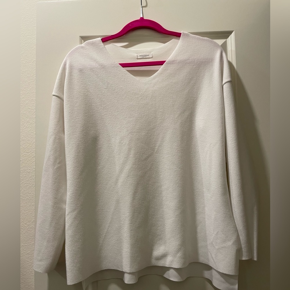 Very unique white sweater top with open sides